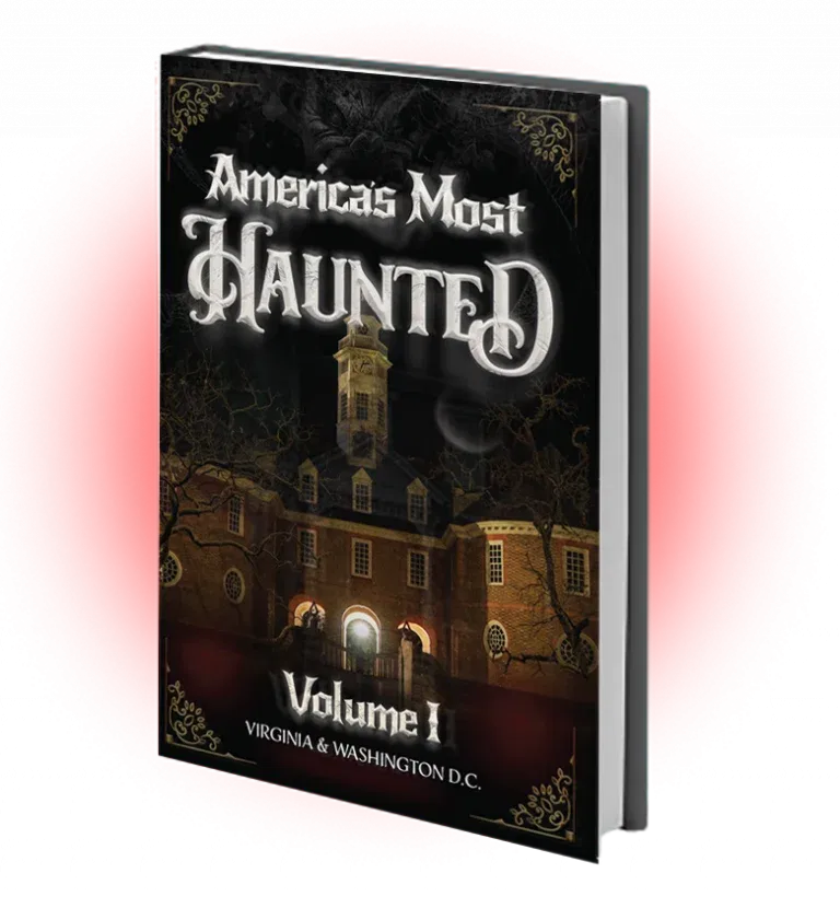 A hardback book titled "America's Most Haunted Volume I: Virginia & Washington D.C." featuring an old building with lit windows and a dark, eerie atmosphere on the cover.